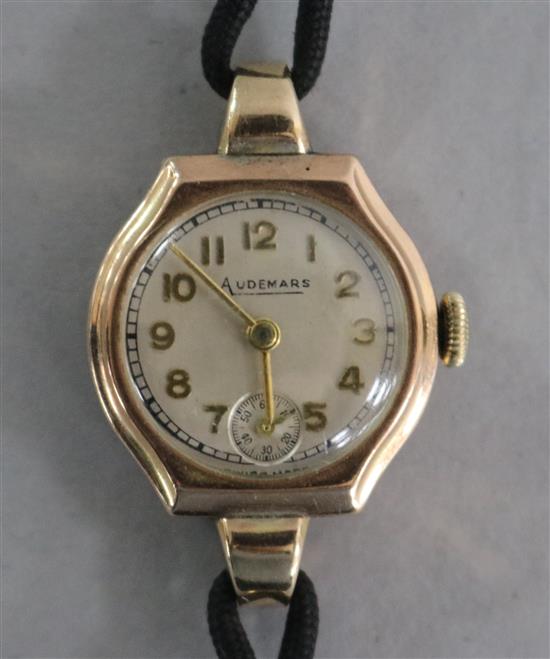 A ladys Audemars 9ct gold-cased wristwatch, with silvered dial, subsidiary seconds and gilt hands and Arabic numerals